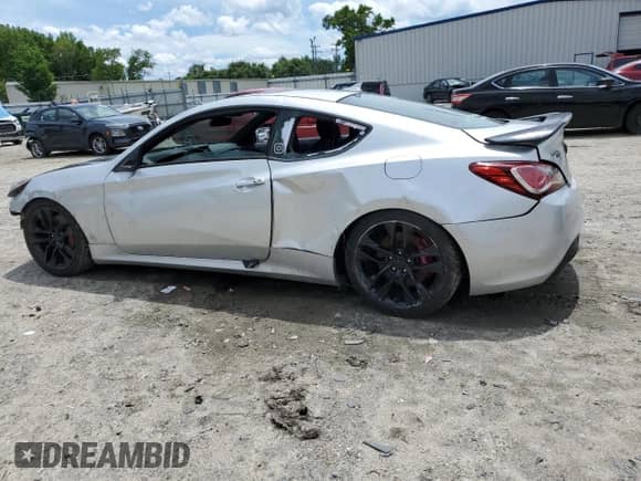 2013 Hyundai Genesis Coupe R-Spec z VIN KMHHU6KJ2DU103155, wystawiony jako Copart lot #57140335 z przebiegiem 117 760 mil mil oraz Szkoda całkowita • Salvage title. Historia ofert i sprzedaży dostępna na DreamBid. Obrazek 2.