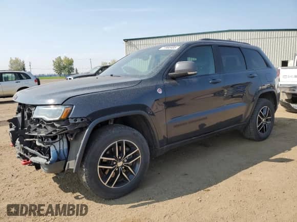 2017 Jeep Grand Cherokee Trailhawk z VIN 1C4RJFLG0HC807936, wystawiony jako Copart lot #71960485 z przebiegiem 143 040 mil mil oraz Szkoda całkowita • Salvage title. Historia ofert i sprzedaży dostępna na DreamBid. Obrazek 1.