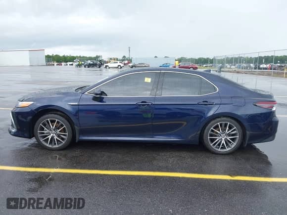 2021 Toyota Camry Hybrid XLE with VIN 4T1F31AK4MU546558, listed as a IAAI auction lot 42235763 with 62,299 mi miles and . Bid and sale history available at DreamBid. Image 14.