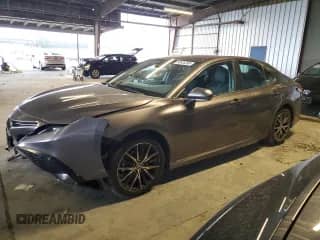 2022 Toyota Camry SE с VIN 4T1G11AK0NU696470, выставлен на аукционе Copart как лот 80535395 с пробегом 84 255 миль миль и Списание • Salvage title. История ставок и продаж доступна на DreamBid. Изображение 1.