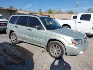 2005 Subaru Forester XS with VIN JF1SG65645H726110, listed as a IAAI auction lot 43036212 with 244,869 mi miles and . Bid and sale history available at DreamBid. Image 1.