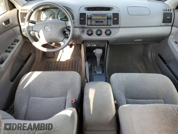 2003 Toyota Camry LE z VIN JTDBE32K030139057, wystawiony jako Copart lot #71503125 z przebiegiem 74 753 mil mil oraz Szkoda całkowita • Salvage title. Historia ofert i sprzedaży dostępna na DreamBid. Obrazek 8.