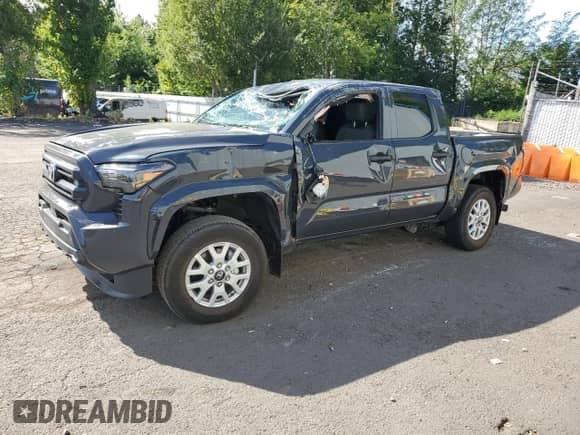 2024 Toyota Tacoma SR with VIN 3TYKD5HN0RT013601, listed as a Copart auction lot 69126575 with 4,033 mi miles and Salvage title. Bid and sale history available at DreamBid. Image 1.