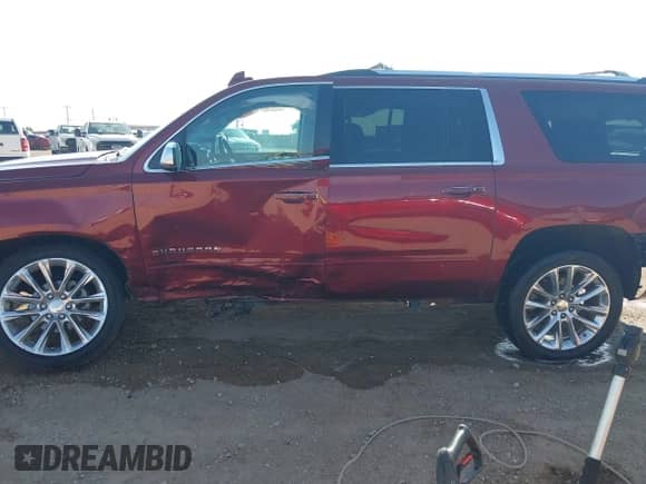 2019 Chevrolet Suburban Premier with VIN 1GNSKJKJ4KR254847, listed as a IAAI auction lot 42501068 with 77,776 mi miles and . Bid and sale history available at DreamBid. Image 14.