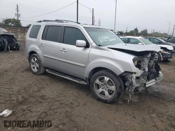 2014 Honda Pilot EX-L with VIN 5FNYF3H60EB019460, listed as a Copart auction lot 88791315 with 144,000 mi miles and Salvage title. Bid and sale history available at DreamBid. Image 4.