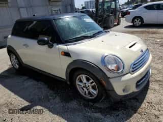 2013 MINI Hardtop with VIN WMWSU3C52DT680782, listed as a Copart auction lot 61779515 with 94,378 mi miles and Salvage title. Bid and sale history available at DreamBid. Image 4.