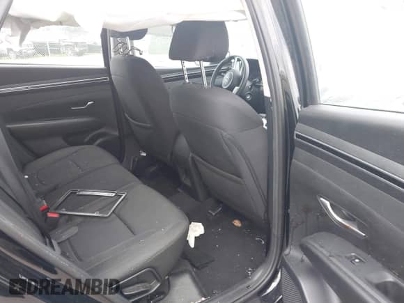 2023 Hyundai Tucson SE with VIN 5NMJACAE9PH183812, listed as a IAAI auction lot 43050593 with 18,512 mi miles and . Bid and sale history available at DreamBid. Image 8.