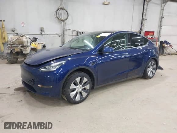 2021 Tesla Model Y Long Range with VIN 5YJYGDEE2MF159264, listed as a IAAI auction lot 43167588 with 83,012 mi miles and . Bid and sale history available at DreamBid. Image 2.