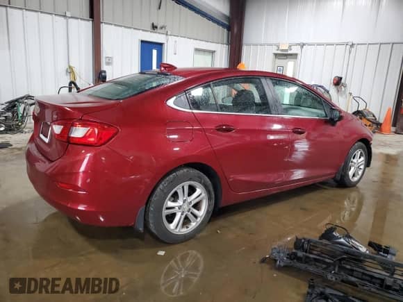 2018 Chevrolet Cruze LT с VIN 1G1BE5SM7J7111749, выставлен на аукционе Copart как лот 85663275 с пробегом 74 039 миль миль и Списание • Salvage title. История ставок и продаж доступна на DreamBid. Изображение 3.