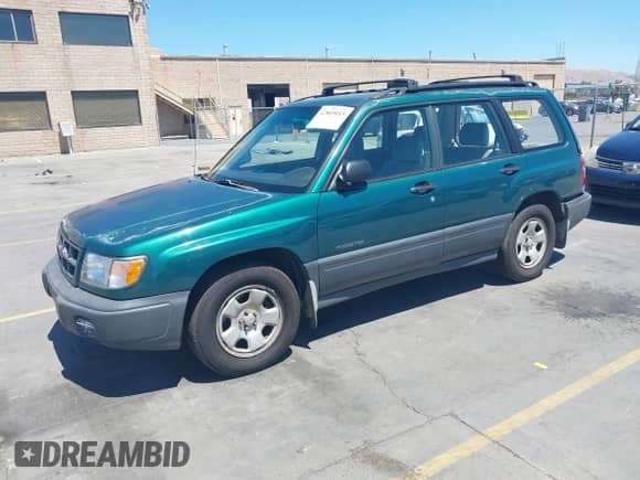 1999 Subaru Forester L with VIN JF1SF6353XG711250, listed as a IAAI auction lot 42805015 with 223,479 mi miles and . Bid and sale history available at DreamBid. Image 2.