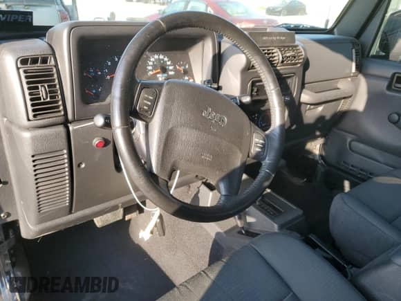 2006 Jeep Wrangler с VIN 1J4FA64S66P738918, выставлен на аукционе Copart как лот 69605634 с пробегом 87 979 миль миль и Списание • Salvage title. История ставок и продаж доступна на DreamBid. Изображение 8.