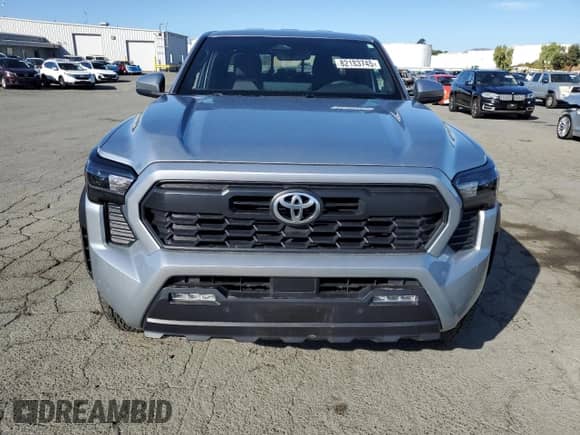 2024 Toyota Tacoma TRD Off Road with VIN 3TMLB5JN8RM000837, listed as a Copart auction lot 82183745 with 14,184 mi miles and Salvage title. Bid and sale history available at DreamBid. Image 5.