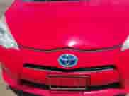 2014 Toyota Prius One z VIN JTDKDTB38E1564132, wystawiony jako IAAI lot #42745732 z przebiegiem 311 489 mil mil oraz . Historia ofert i sprzedaży dostępna na DreamBid. Obrazek 6.