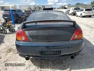2003 Hyundai Tiburon GT with VIN KMHHN65F03U066786, listed as a Copart auction lot 84249025 with 178,084 mi miles and Clean title. Bid and sale history available at DreamBid. Image 6.