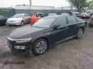 2020 Honda Accord Touring with VIN 1HGCV3F93LA016411, listed as a IAAI auction lot 42355462 with 99,137 mi miles and . Bid and sale history available at DreamBid. Image 2.
