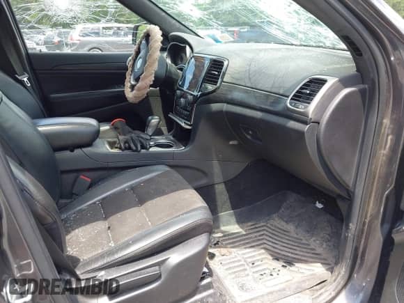2020 Jeep Grand Cherokee Laredo E with VIN 1C4RJFAG3LC222232, listed as a IAAI auction lot 42636691 with 94,553 mi miles and . Bid and sale history available at DreamBid. Image 5.