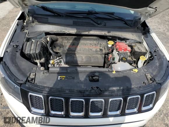 2019 Jeep Compass Latitude z VIN 3C4NJCBB6KT715423, wystawiony jako Copart lot #55070705 z przebiegiem 74 576 mil mil oraz Szkoda całkowita • Salvage title. Historia ofert i sprzedaży dostępna na DreamBid. Obrazek 11.