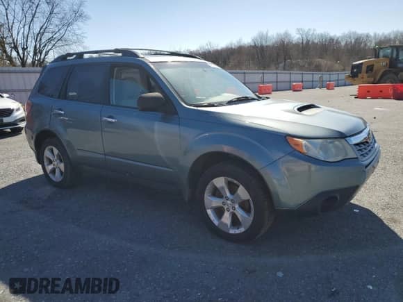 2012 Subaru Forester XT Premium z VIN JF2SHGACXCH440706, wystawiony jako Copart lot #51019195 z przebiegiem 133 148 mil mil oraz Czysty tytuł • Clean title. Historia ofert i sprzedaży dostępna na DreamBid. Obrazek 4.