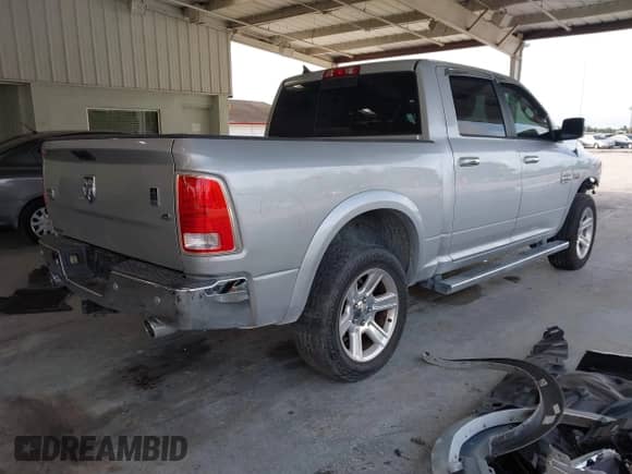 2015 Ram 1500 Laramie Limited with VIN 1C6RR7PT1FS788507, listed as a IAAI auction lot 42400146 with 129,572 mi miles and . Bid and sale history available at DreamBid. Image 4.