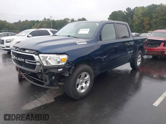 2020 Ram 1500 Big Horn z VIN 1C6RRFFG1LN334007, wystawiony jako IAAI lot #43338214 z przebiegiem 126 926 mil mil oraz . Historia ofert i sprzedaży dostępna na DreamBid. Obrazek 2.