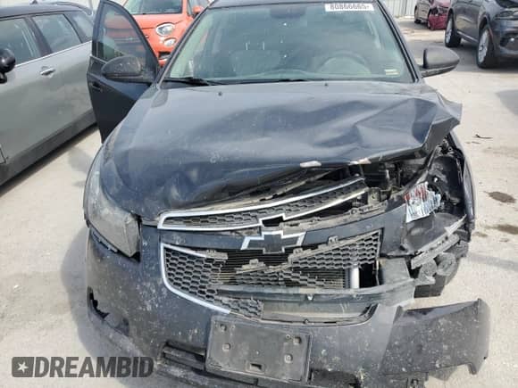 2013 Chevrolet Cruze LS z VIN 1G1PA5SHXD7250122, wystawiony jako Copart lot #80866665 z przebiegiem 214 478 mil mil oraz Szkoda całkowita • Salvage title. Historia ofert i sprzedaży dostępna na DreamBid. Obrazek 11.