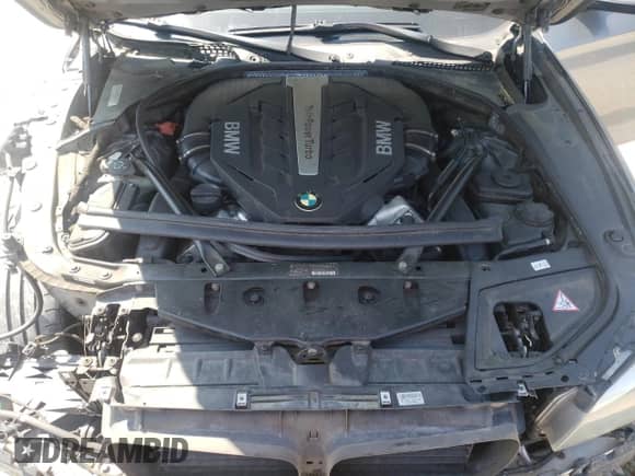 2012 BMW 5 Series 550i xDrive with VIN WBAFU9C5XCC787677, listed as a Copart auction lot 53739555 with 155,910 mi miles and Salvage title. Bid and sale history available at DreamBid. Image 11.