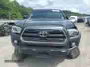2017 Toyota Tacoma SR5 с VIN 3TMCZ5AN3HM081109, выставлен на аукционе Copart как лот 61154625 с пробегом 59 552 миль миль и Списание • Salvage title. История ставок и продаж доступна на DreamBid. Изображение 5.