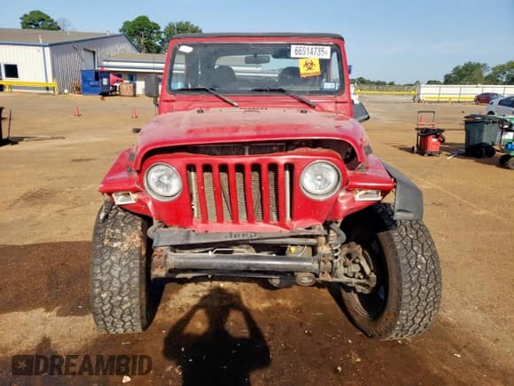2000 Jeep Wrangler SE with VIN 1J4FA29P6YP703375, listed as a Copart auction lot 66914735 with 174,624 mi miles and Salvage title. Bid and sale history available at DreamBid. Image 5.