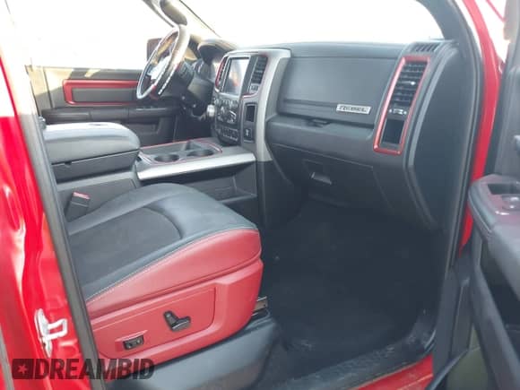 2018 Ram 1500 Rebel with VIN 1C6RR7YT8JS178952, listed as a IAAI auction lot 40514135 with 122,955 mi miles and . Bid and sale history available at DreamBid. Image 5.