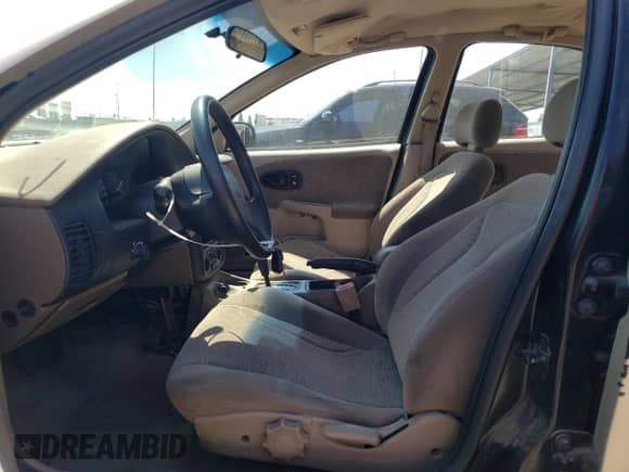 2000 Saturn SL with VIN 1G8ZK5274YZ103237, listed as a Copart auction lot 60558105 with 126,320 mi miles and Salvage title. Bid and sale history available at DreamBid. Image 7.