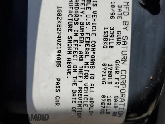 1997 Saturn SW with VIN 1G8ZK8274VZ194085, listed as a Copart auction lot 50230135 with 211,051 mi miles and Salvage title. Bid and sale history available at DreamBid. Image 12.