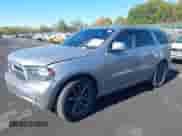 2014 Dodge Durango R/T with VIN 1C4SDJCT3EC304065, listed as a IAAI auction lot 43506074 with 193,719 mi miles and . Bid and sale history available at DreamBid. Image 2.