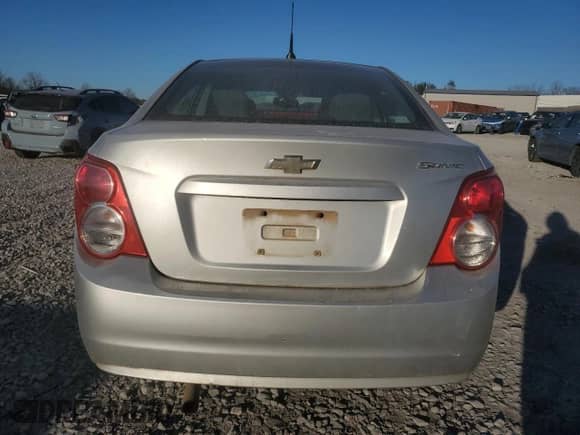 2012 Chevrolet Sonic LS z VIN 1G1JB5SH2C4152334, wystawiony jako Copart lot #46574475 z przebiegiem 145 396 mil mil oraz Szkoda całkowita • Salvage title. Historia ofert i sprzedaży dostępna na DreamBid. Obrazek 6.