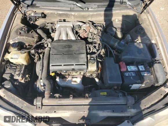 1995 Toyota Camry LE с VIN 4T1GK12E9SU100869, выставлен на аукционе Copart как лот 80628715 с пробегом 310 283 миль миль и Списание • Salvage title. История ставок и продаж доступна на DreamBid. Изображение 11.