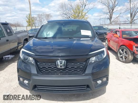 2021 Honda Passport EX-L with VIN 5FNYF8H51MB024220, listed as a IAAI auction lot 41882877 with 53,212 mi miles and . Bid and sale history available at DreamBid. Image 12.