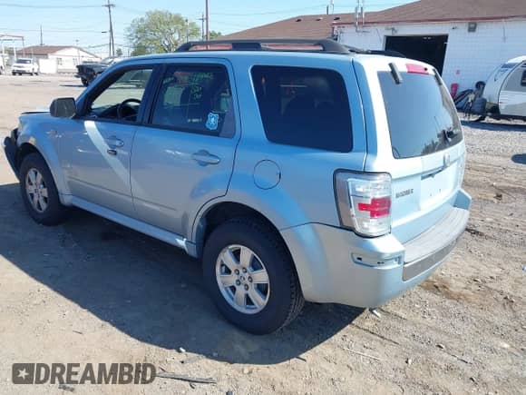 2008 Mercury Mariner with VIN 4M2CU91198KJ24730, listed as a IAAI auction lot 43341107 with 158,521 mi miles and . Bid and sale history available at DreamBid. Image 3.