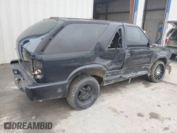 2002 Chevrolet Blazer LS с VIN 1GNCS18WX2K134115, выставлен на аукционе Copart как лот 70031785 с пробегом 179 669 миль миль и На запчасти • Non repairable. История ставок и продаж доступна на DreamBid. Изображение 3.