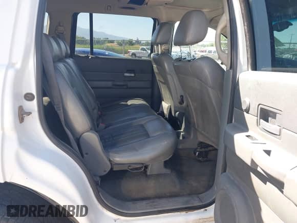 2006 Dodge Durango Limited with VIN 1D8HB58296F171501, listed as a IAAI auction lot 42507377 with 210,735 mi miles and . Bid and sale history available at DreamBid. Image 8.
