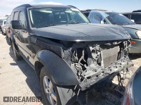 2009 Dodge Nitro SE с VIN 1D8GT28K39W521880, выставлен на аукционе Copart как лот 49750755 с пробегом 131 593 миль миль и Списание • Salvage title. История ставок и продаж доступна на DreamBid. Изображение 5.