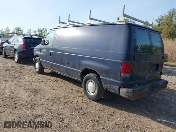 2002 Ford Econoline Cargo with VIN 1FTRE142X2HA67221, listed as a IAAI auction lot 42079493 with 180,324 mi miles and . Bid and sale history available at DreamBid. Image 3.