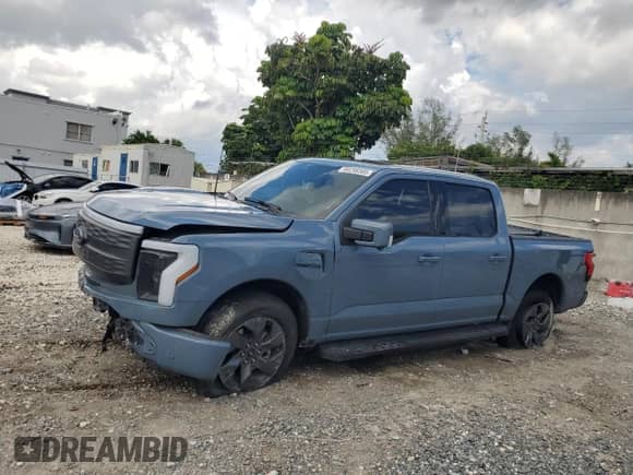 2023 Ford F-150 Lightning Pro with VIN 1FTVW1EV9PWG26295, listed as a Copart auction lot 80298305 with 43,492 mi miles and Salvage title. Bid and sale history available at DreamBid. Image 1.