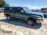 1997 Dodge 1500 с VIN 1B7HF16Y0VJ527476, выставлен на аукционе Copart как лот 70545225 с пробегом 124 644 миль миль и Списание • Salvage title. История ставок и продаж доступна на DreamBid. Изображение 4.