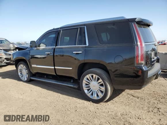 2017 Cadillac Escalade Platinum with VIN 1GYS4DKJ8HR314197, listed as a Copart auction lot 56509365 with 148,400 mi miles and Salvage title. Bid and sale history available at DreamBid. Image 2.