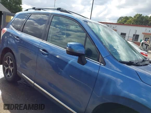 2016 Subaru Forester XT Touring with VIN JF2SJGVC6GH403009, listed as a IAAI auction lot 43394644 with 160,180 mi miles and . Bid and sale history available at DreamBid. Image 13.