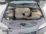 2015 Chrysler 300 C z VIN 2C3CCAEG1FH815588, wystawiony jako Copart lot #71084705 z przebiegiem 168 996 mil mil oraz Szkoda całkowita • Salvage title. Historia ofert i sprzedaży dostępna na DreamBid. Obrazek 11.