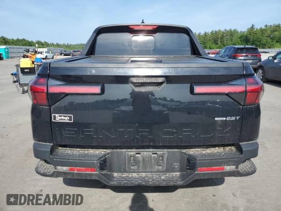 2023 Hyundai Santa Cruz SEL Premium with VIN 5NTJDDAF3PH057049, listed as a Copart auction lot 61165645 with 75,980 mi miles and Salvage title. Bid and sale history available at DreamBid. Image 6.