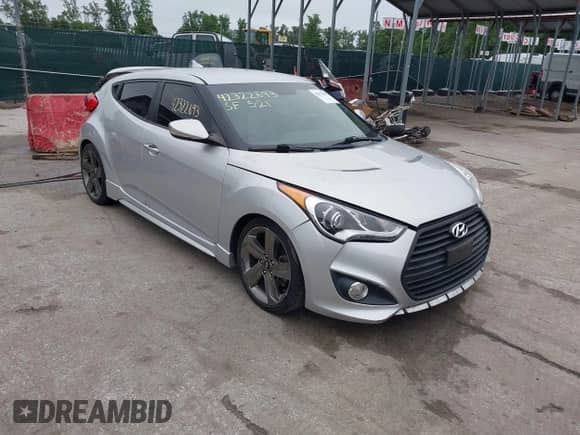 2014 Hyundai Veloster Turbo with VIN KMHTC6AE6EU206856, listed as a IAAI auction lot 42322693 with 111,716 mi miles and . Bid and sale history available at DreamBid. Image 1.