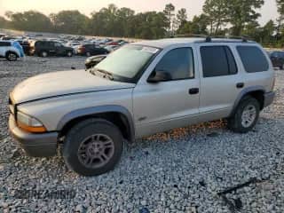 2002 Dodge Durango Sport with VIN 1B4HR38NX2F101120, listed as a Copart auction lot 58939005 with 162,631 mi miles and Salvage title. Bid and sale history available at DreamBid. Image 1.