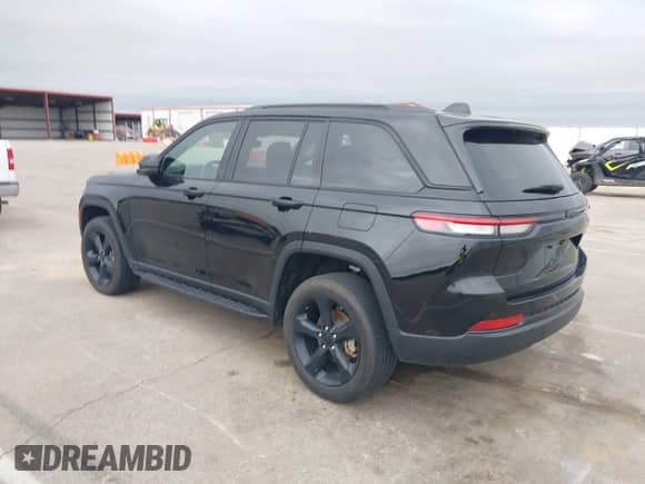2023 Jeep Grand Cherokee Altitude with VIN 1C4RJGAG8PC648073, listed as a IAAI auction lot 42338453 with 30,505 mi miles and . Bid and sale history available at DreamBid. Image 3.