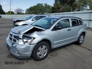2007 Dodge Caliber with VIN 1B3HB28B87D324624, listed as a Copart auction lot 72004565 with 129,011 mi miles and Salvage title. Bid and sale history available at DreamBid. Image 1.